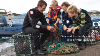 Guy and his family on the Isle of Mull quayside