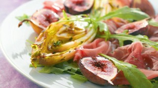 Chargrilled Chicory with Prosciutto and Figs served on a plate