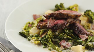 Herby Roast Lamb Neck with Petit Pois a la Francaise served with vegetables