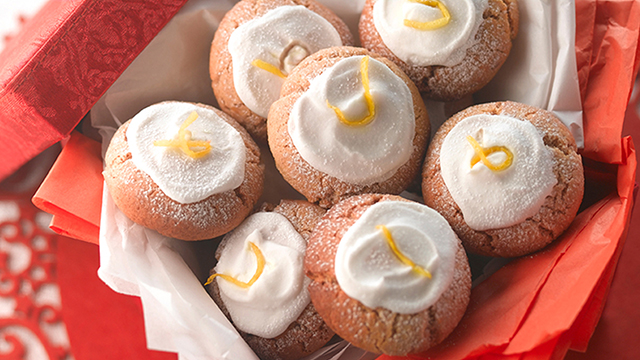 Traditional Lebkuchen Biscuits topped with icing and served in a red box