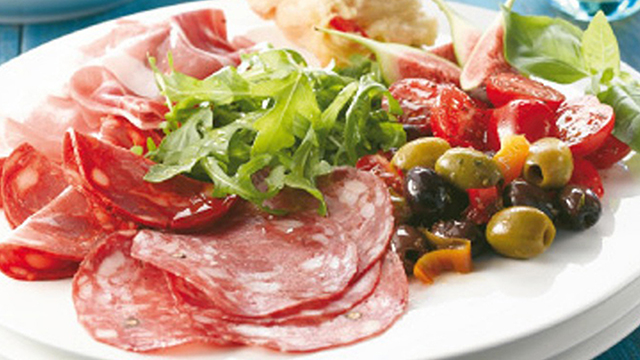 Booths tapas platter with salami, proscuitto, chorizo, green olives, rocket and plum tomatoes