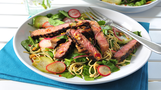 Teriyaki Beef and Rice Noodle Salad served in a white dish