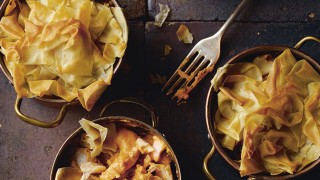 Three filo fish pies served in individual dishes