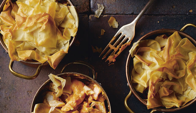 Three filo fish pies served in individual dishes