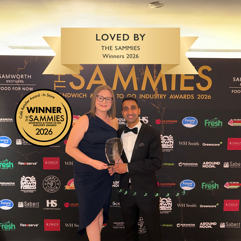 A photo of our two hospitality Buyers collecting the In Store café retailer of the year award `t The Sammies 2026