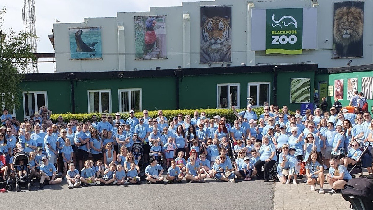 Image of a group of people stood outside Blackpool Zoo