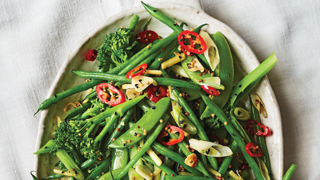 Green Bean and Broccoli Stir-Fry served with chillies in a white dish