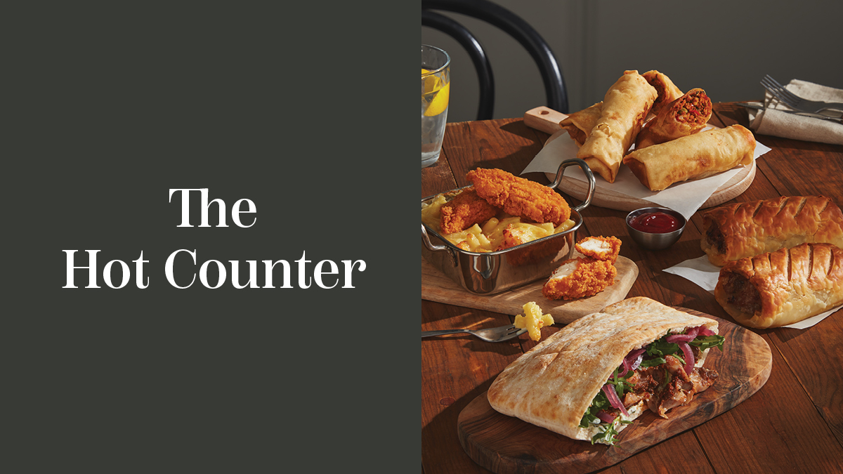 The Hot Counter banner with a group image of various sandwiches, rolls and chicken strips from the range