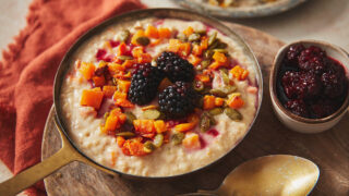 Pumpkin porridge with blackberries in the centre