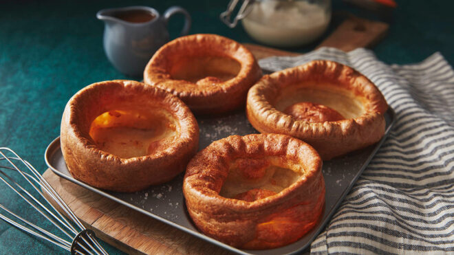 4 sourdough Yorkshire puddings in a baking tray