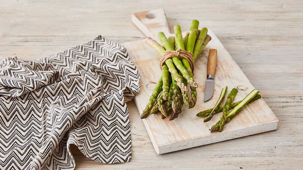 UK Asparagus on a chopping board