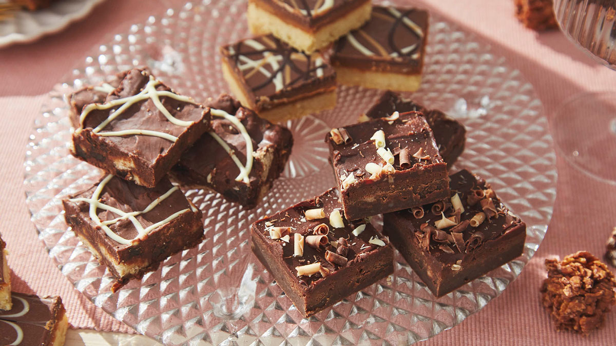 A selection of booths cake bites on a glass dish