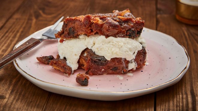 Caramelised Christmas Pudding Ice Cream Sandwiches served on a pink plate