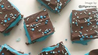 Cumbrian Millionaires Shortbread with blue decorations on a white background