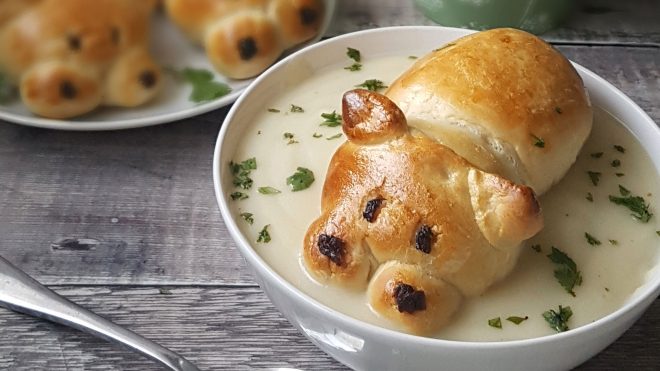 Hungry Hippo Soup Rolls with sultanas for noses sitting in a bowl of soup