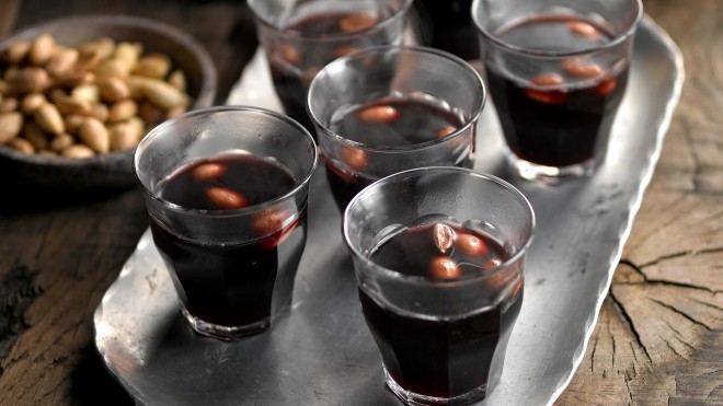 Scandinavian Spiced Mulled Wine served in six glasses with almonds in the glasses