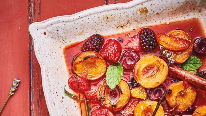 Spiced Apricots and Summer Berries served in a dish and topped with mint leaves