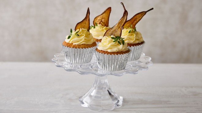 Prosecco, Pear and Elderflower Cupcakes, served on a glass dish