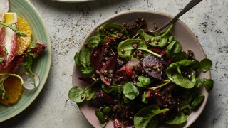 Puy Lentil and Roasted Beetroot Salad served in a lilac bowl