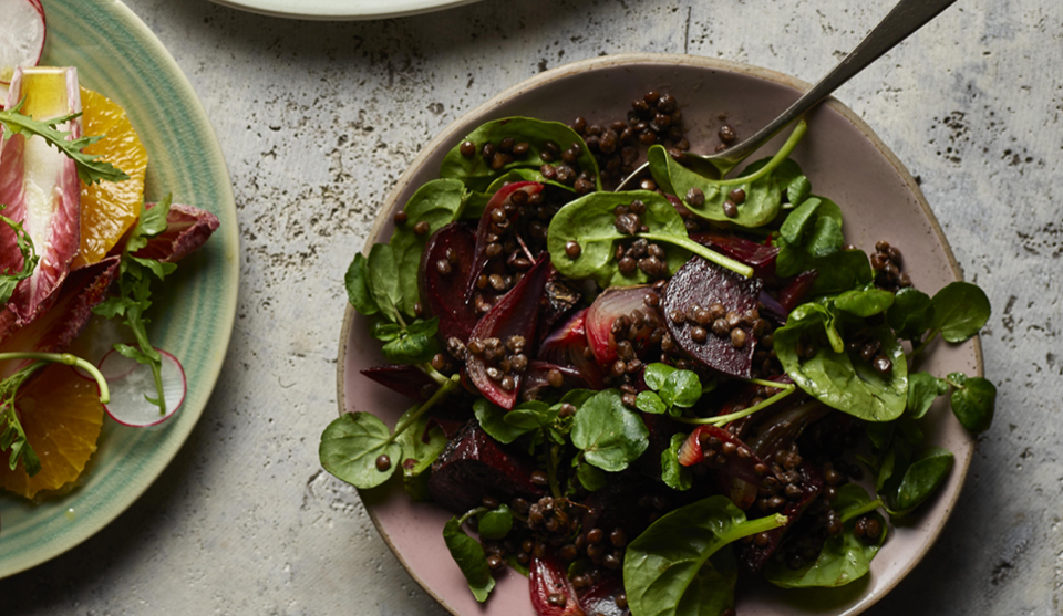 Puy Lentil and Roasted Beetroot Salad served in a lilac bowl