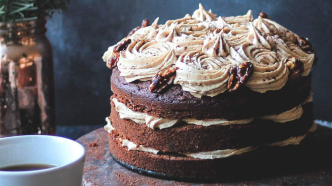 Coffee and Caramelised Walnut Cake served on a black plate