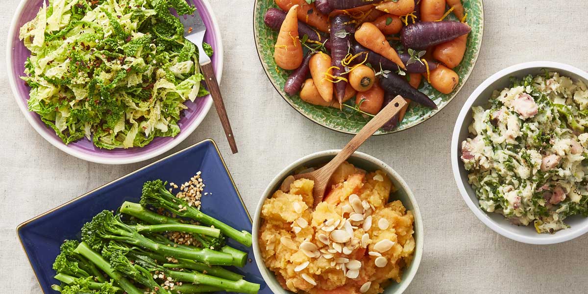 Veggies Enough for 4 served in various shaped bowls including sweet potato, cabbage and chantenay carrots