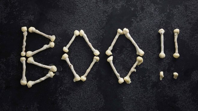 Halloween White Chocolate Bones spelling out the word BOO